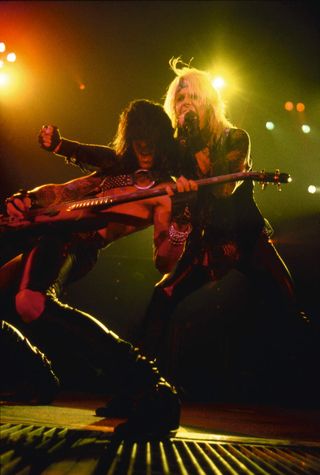 Nikki Sixx and Vince Neil onstage