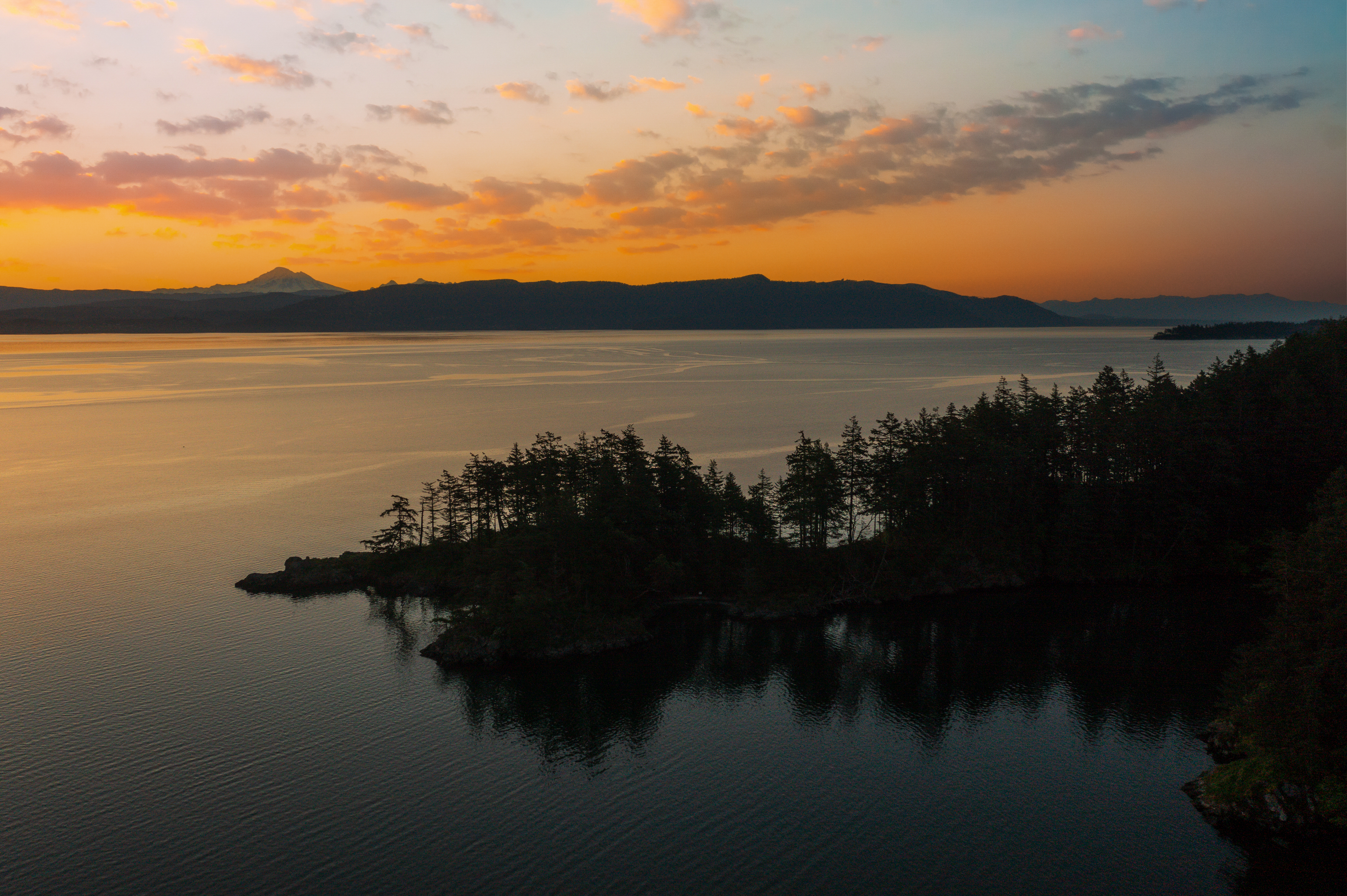 Lummi Island's Abner Point at sunset with Mt. Baker in the background