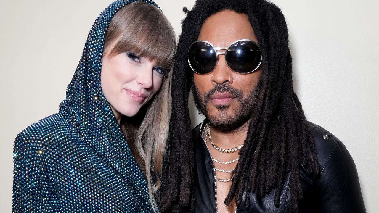 Taylor Swift and host Lenny Kravitz attend the 2023 iHeartRadio Music Awards at Dolby Theatre in Los Angeles, California