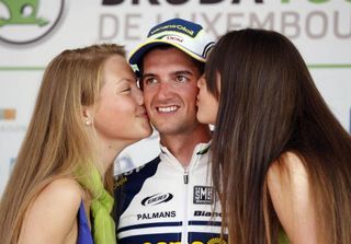 Poels is all smiles on the winner's rostrum