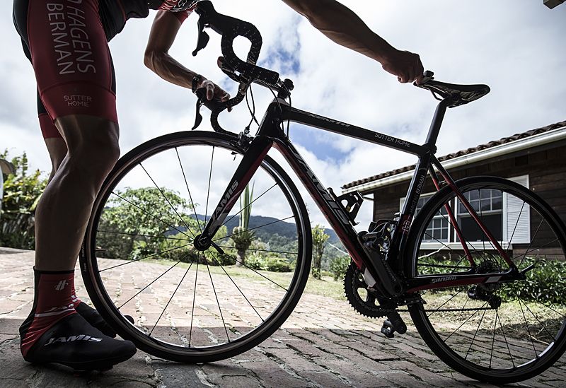 A rider puts on the finishing touches to his Jamis bike