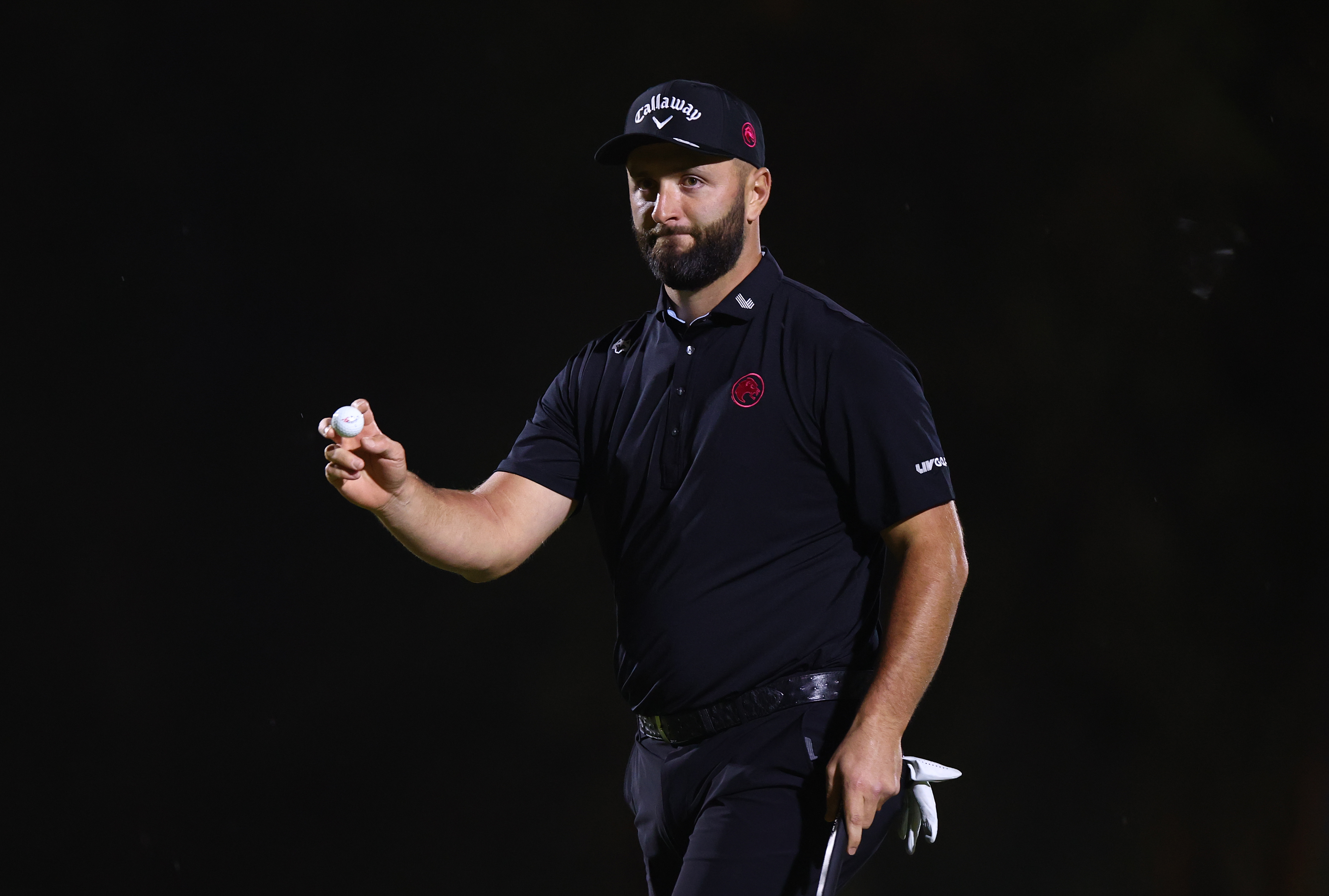 Jon Rahm waves to the crowd