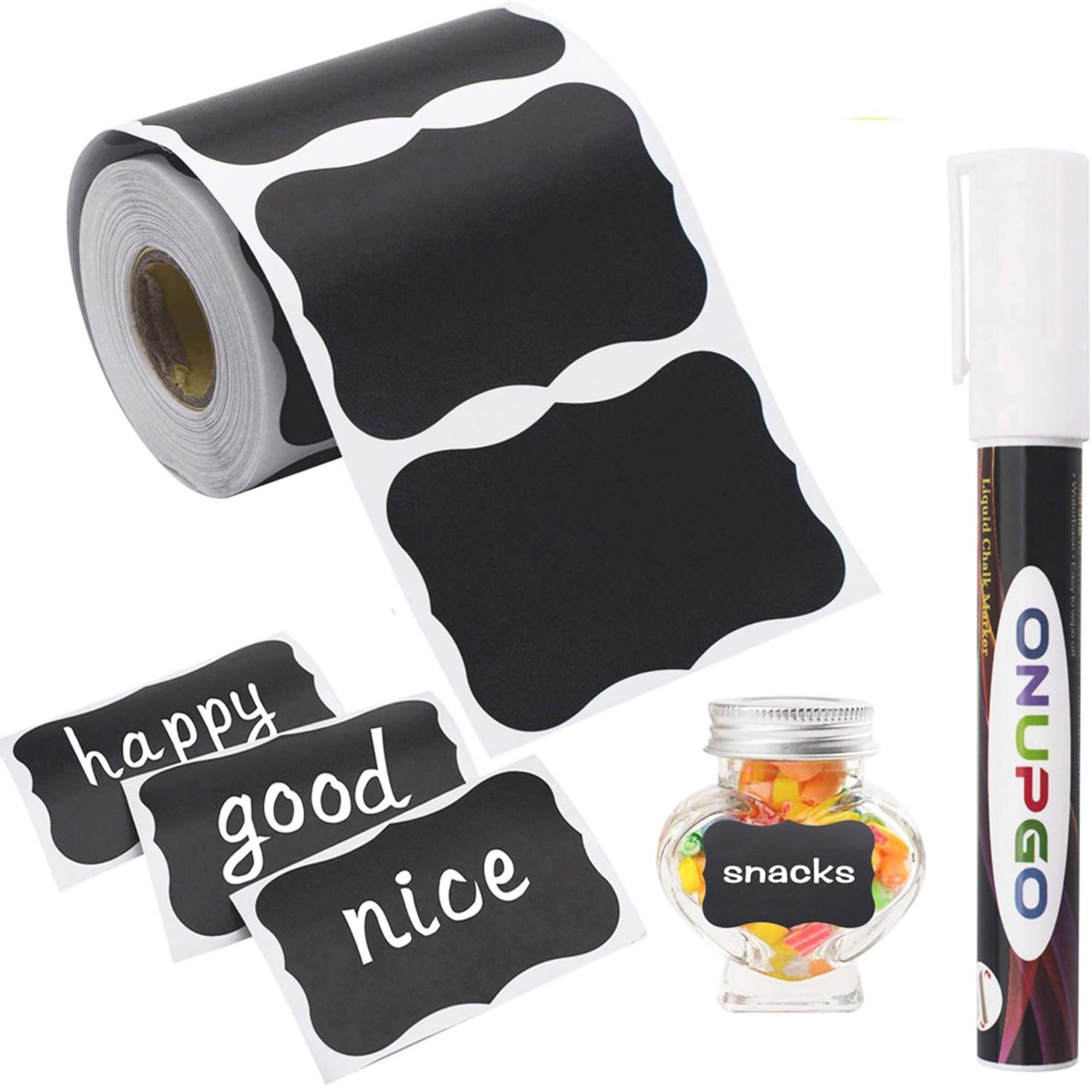 A white roll of black chalkboard labels with a white chalkboard pen and labelled jar of sweets
