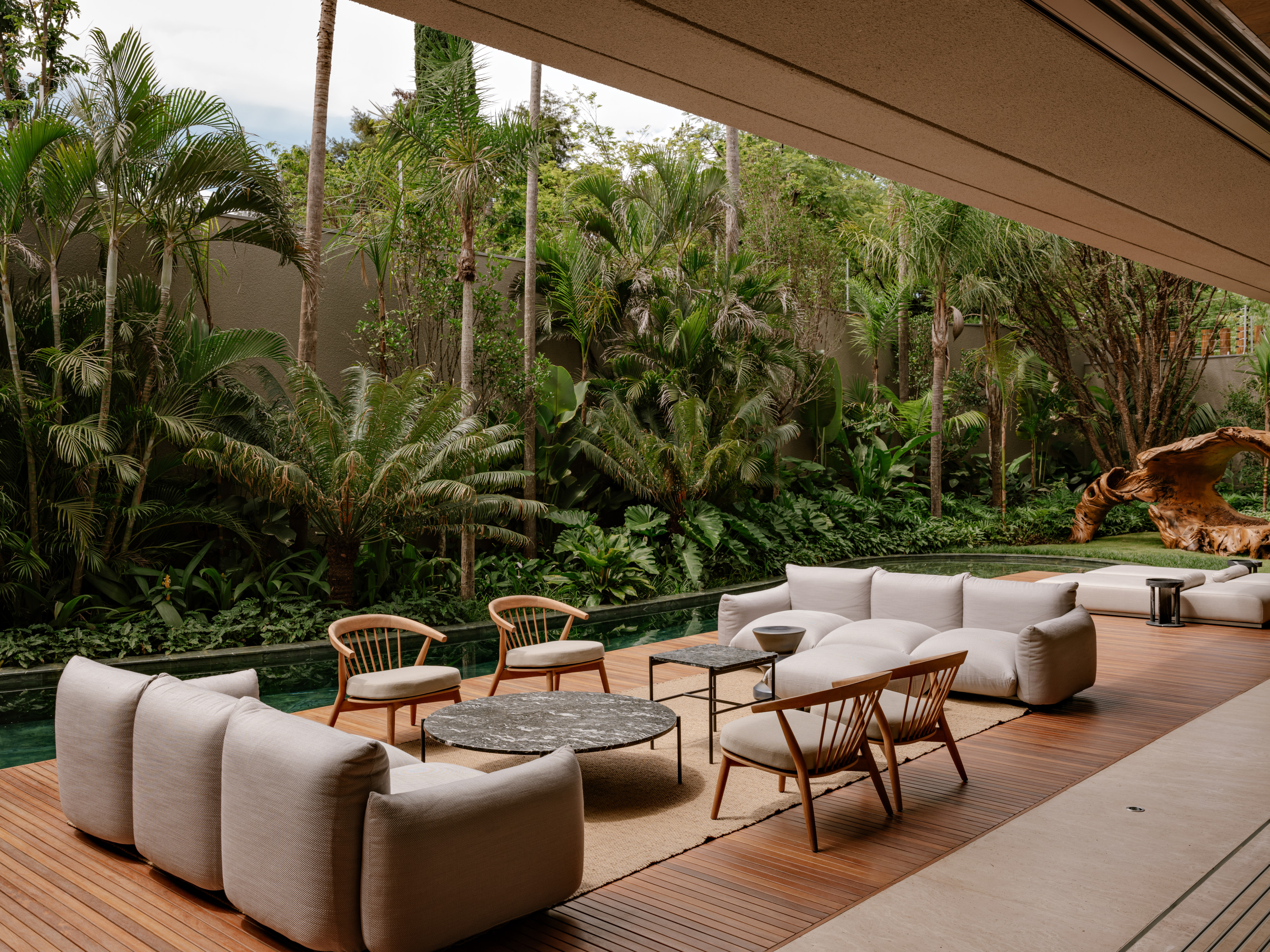 A generous terrace overlooks the pool