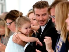 Harper Beckham and David Beckham at NYFW