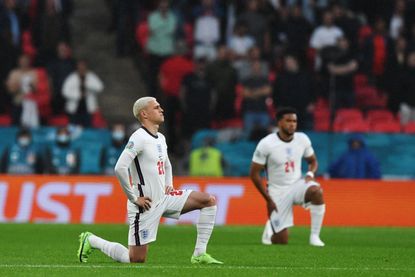 Players take the knee against racism before the UEFA EURO 2020