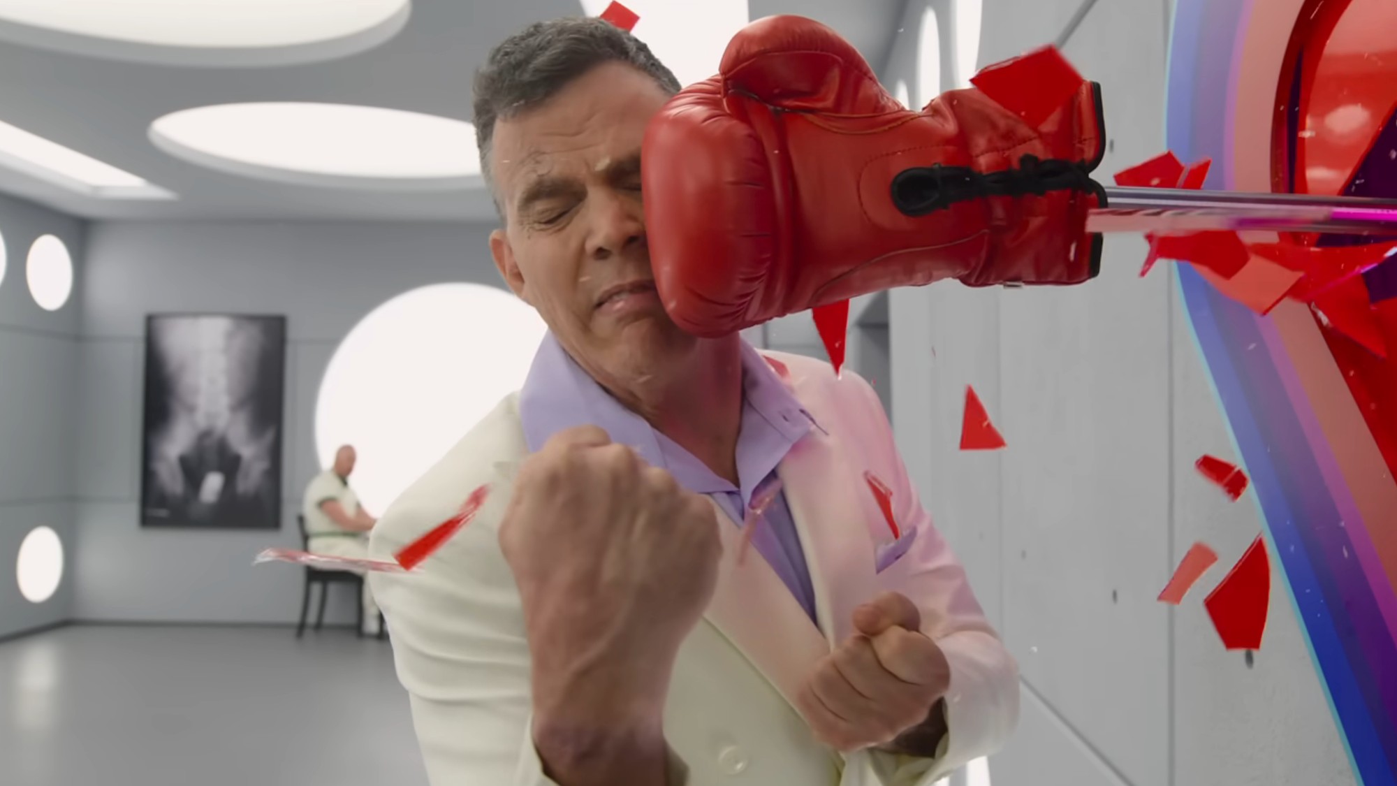 Steve-O getting hit in the face with a red boxing glove in Jackass: Best and Last
