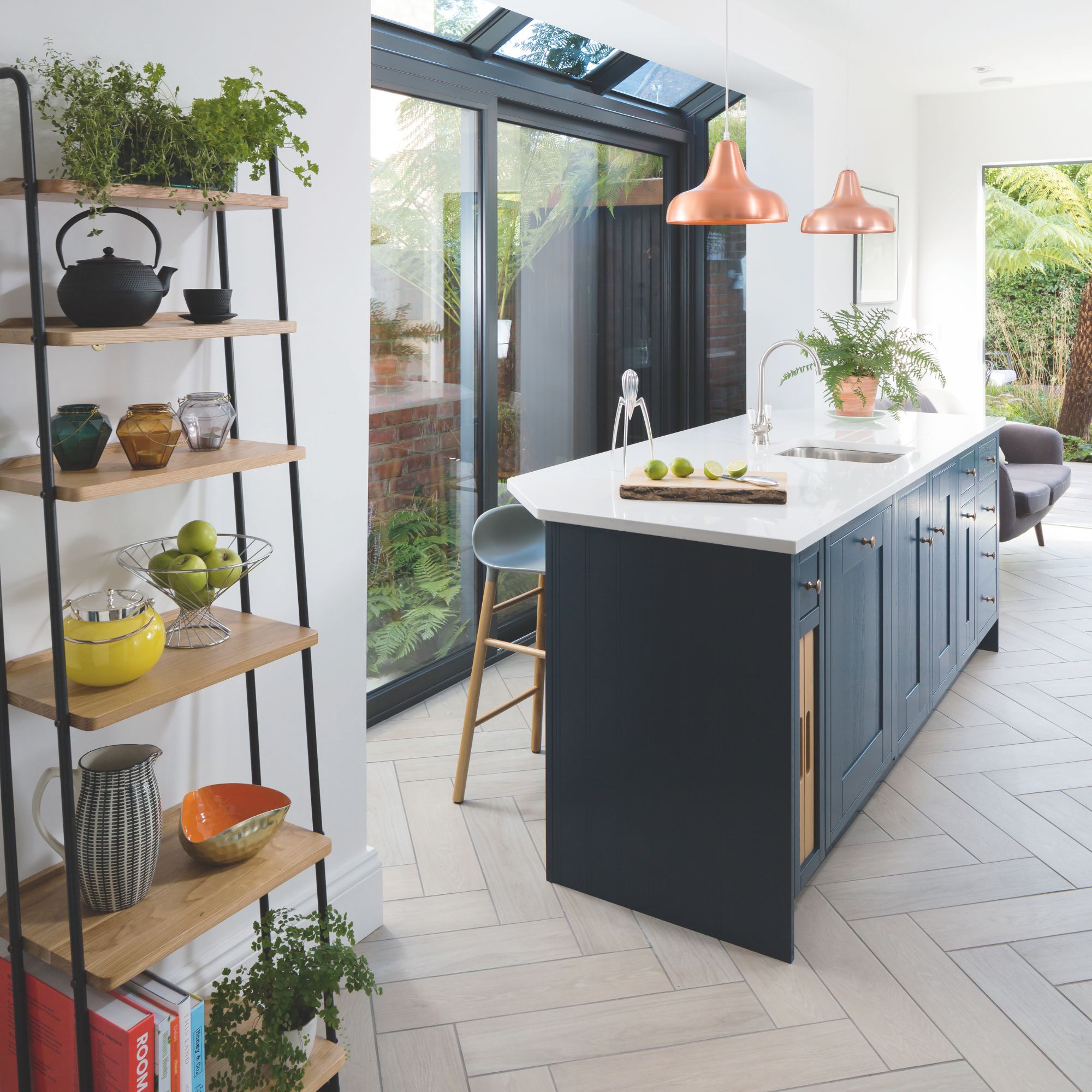 modern kitchen scheme with wooden herringbone for a statement flooring