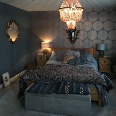 glam Moroccan style bedroom with dark grey walls