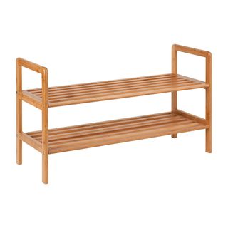 Wooden two-tier shoe rack on white background