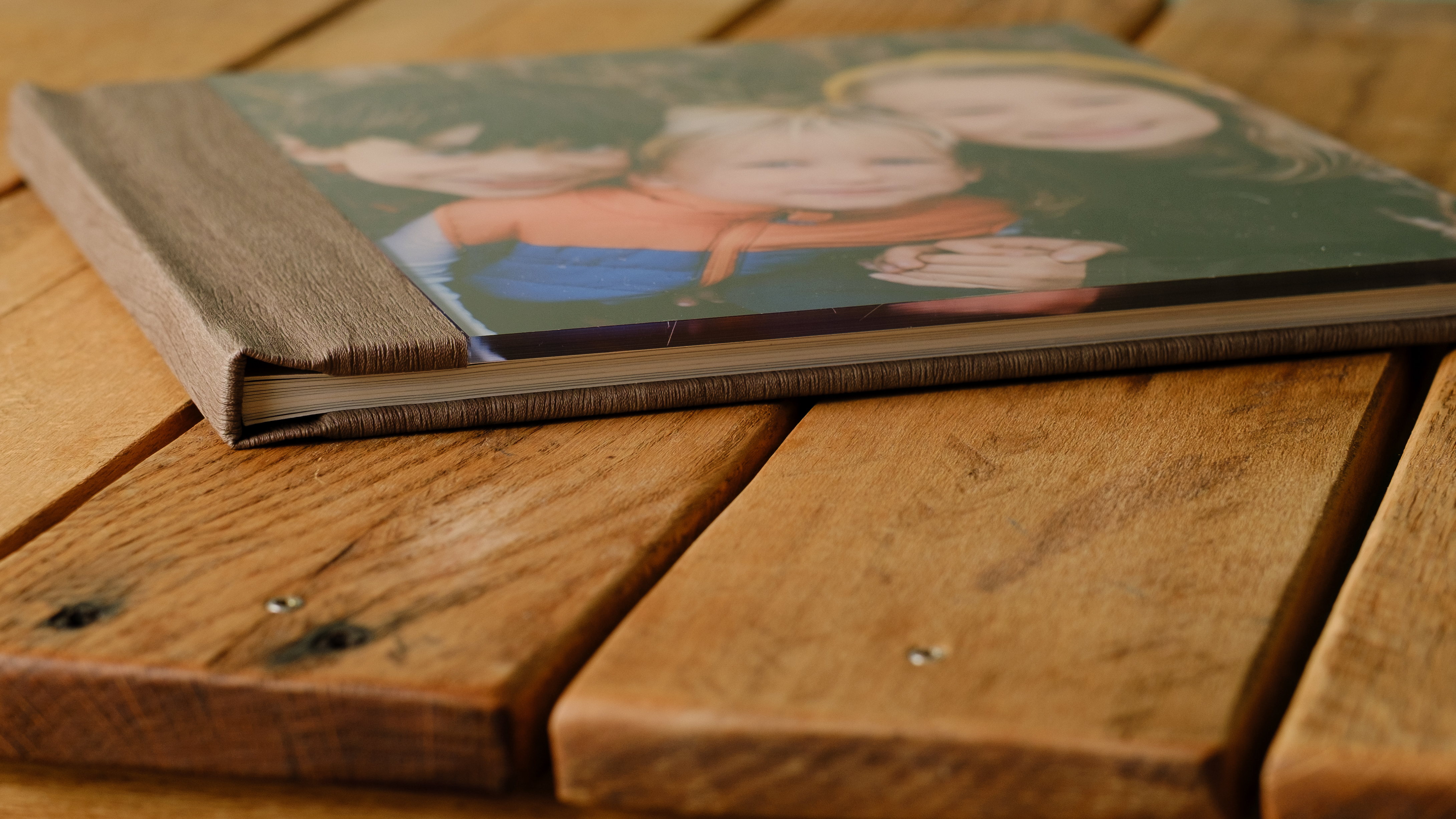 Photo books from Saal on a desktop