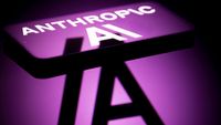The Anthropic AI logo is displayed on a mobile phone with a visual digital reflected background in this photo illustration in Brussels, Belgium, on December 7, 2025. (Photo by Jonathan Raa/NurPhoto via Getty Images)