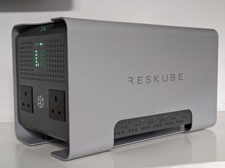 The Reskube Home Pro on a desk