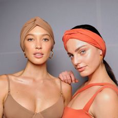 two models after applying self-tanner