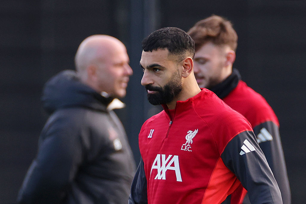 KIRKBY, ENGLAND - DECEMBER 08: Mohamed Salah of Liverpool looks on as Arne Slot, Manager of Liverpool, is seen during a Liverpool Training Session at AXA Training Centre on December 08, 2025 in Kirkby, England. (Photo by Lewis Storey/Getty Images)