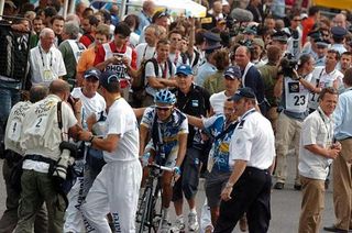 Cyril Dessel (AG2R) is mobbed