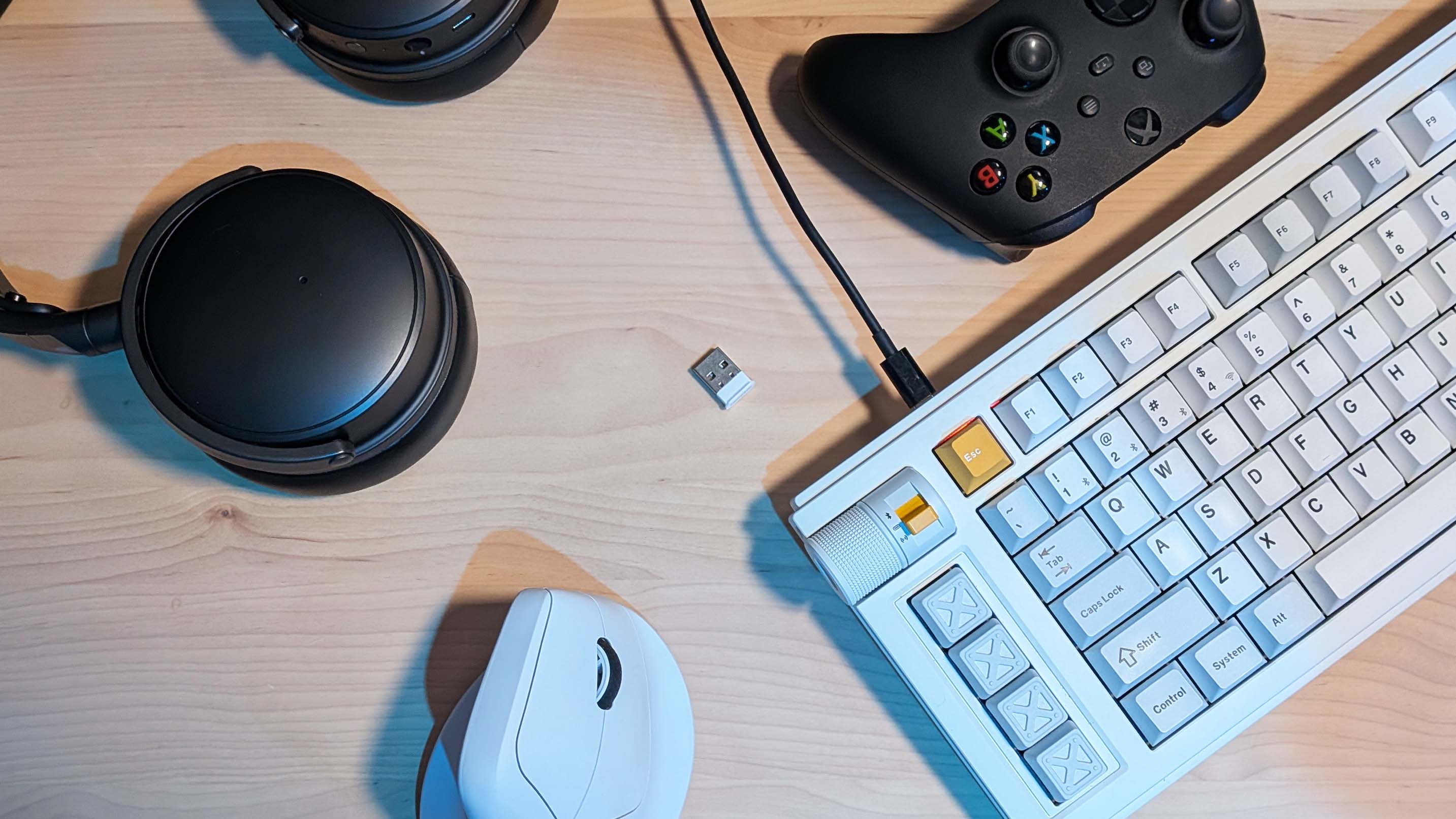 Selection of wireless gaming peripherals, including an Xbox controller, an Audeze Maxwell headset, Lemokey L1 HE keyboard, and Keychron M5 mouse