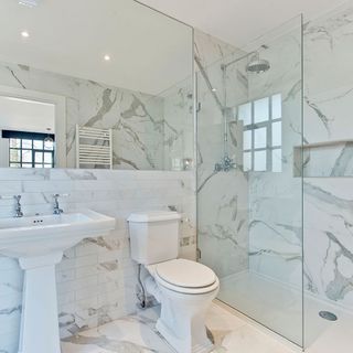 bathroom with porcelain titles and shower
