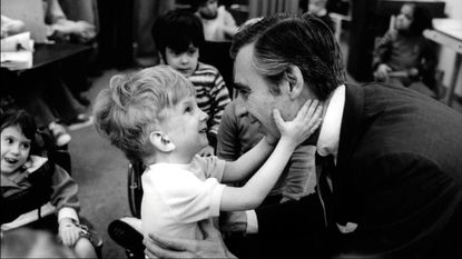 Fred Rogers and a boy.