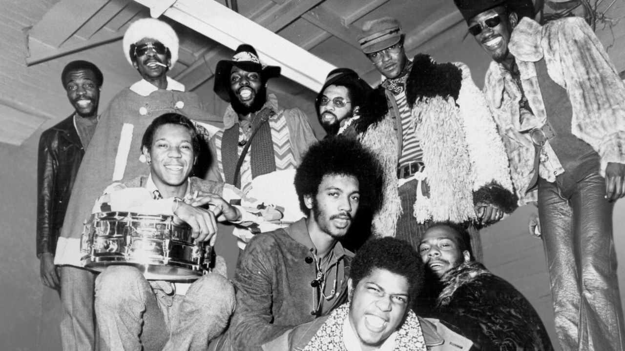Ray Davis, Cavin Simon, Grady Thomas, Fuzzy Haskins, Tawl Ross, Bernie Worrell, (bottom row L-R) Tiki Fulwood, Eddie Hazel, George Clinton, Billy "Bass" Nelson of the funk band Parliament-Funkadelic pose for a portrait in circa 1974.