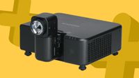 Fujifilm FP-ZUH6000 projector on a yellow background