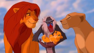 simba and nala smiling at rafiki and their baby at the end of the lion king