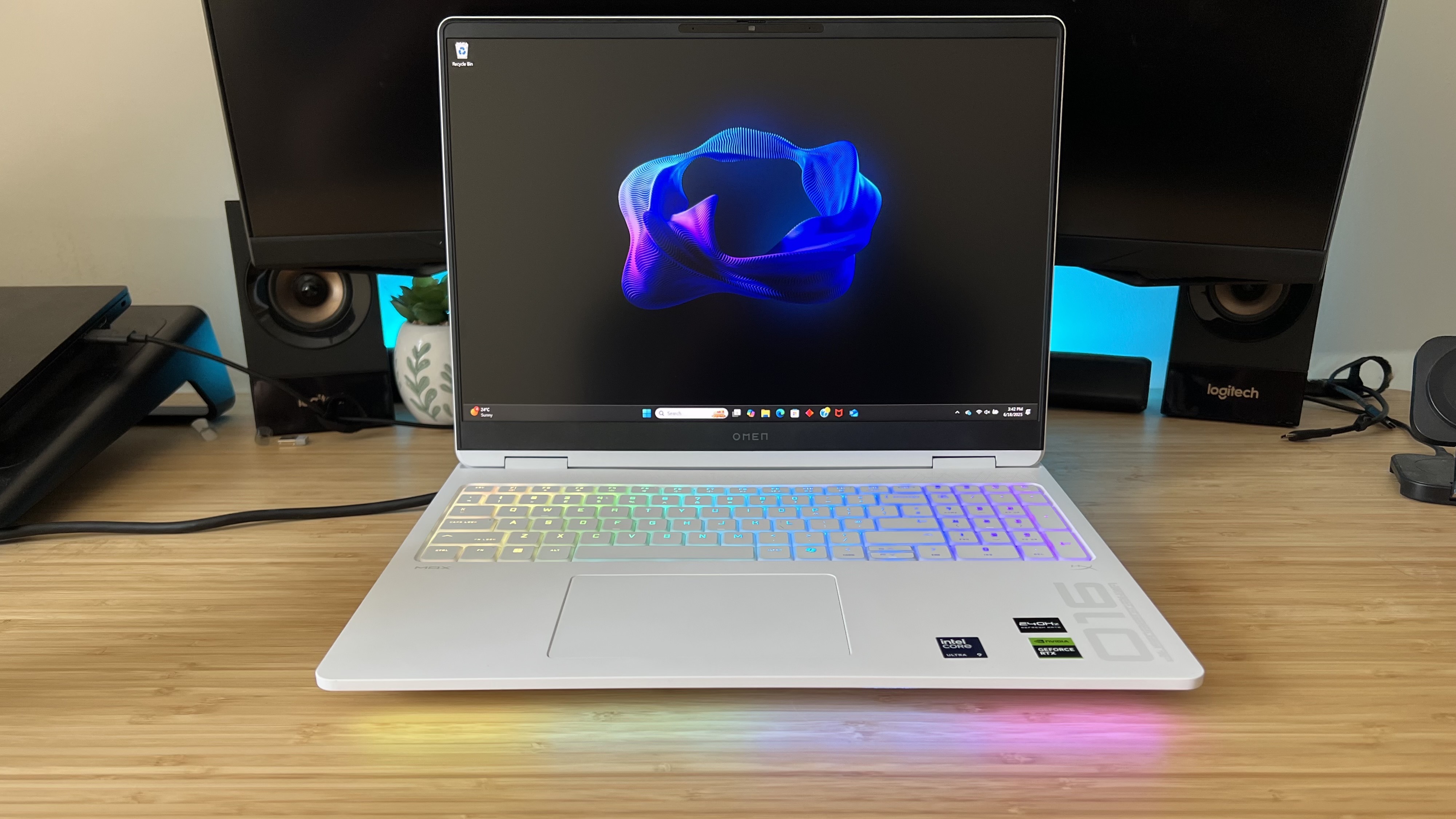 HP Omen Max 16 gaming laptop on a wooden desk