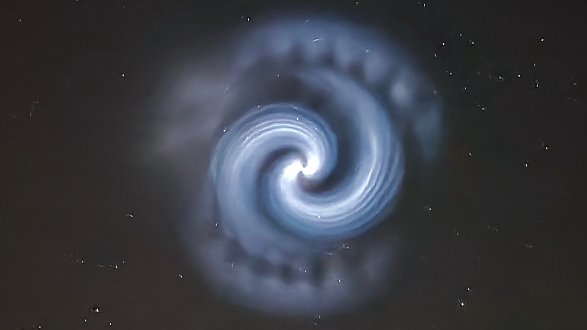 An incredible image of a mystery blue spiral that appeared in the skies over Europe on Monday (March 24). This image was captured by Daniel Puchalski from Poland.