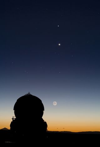 In March 2008, Yuri Beletsky, astronomer at ESO's Very Large Telescope (VLT) observatory at Paranal in northern Chile, caught this rare sight. In the sky above the observing deck, the planets Mercury (highest) and Venus were in alignment above the Moon,