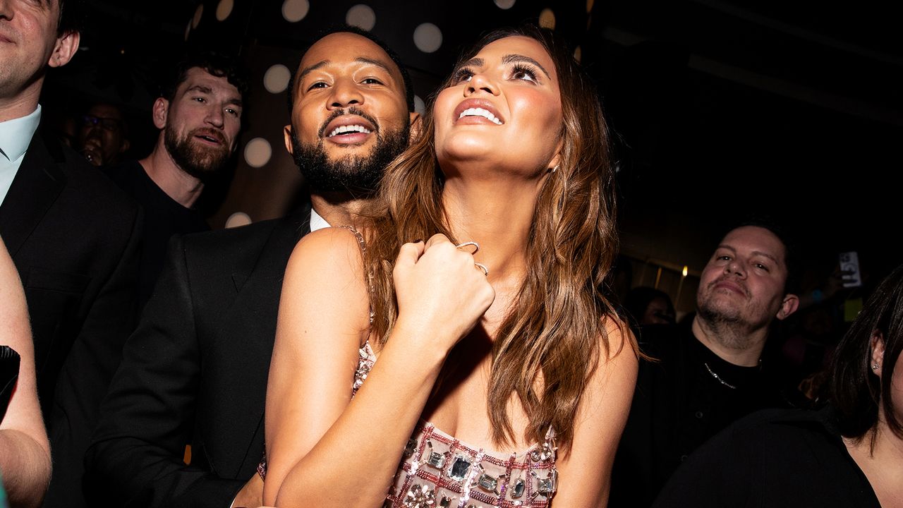 John Legend and Chrissy Teigen at the Sports Illustrated Swim Issue Launch Party held at the Hard Rock Hotel on May 16, 2024 in New York City.