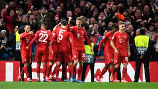 Bayern Munich players celebrate their opening goal against Chelsea at Stamford Bridge