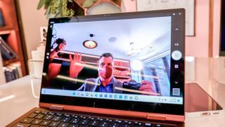 Samsung Galaxy Book2 Pro 360 open on table showing webcam display