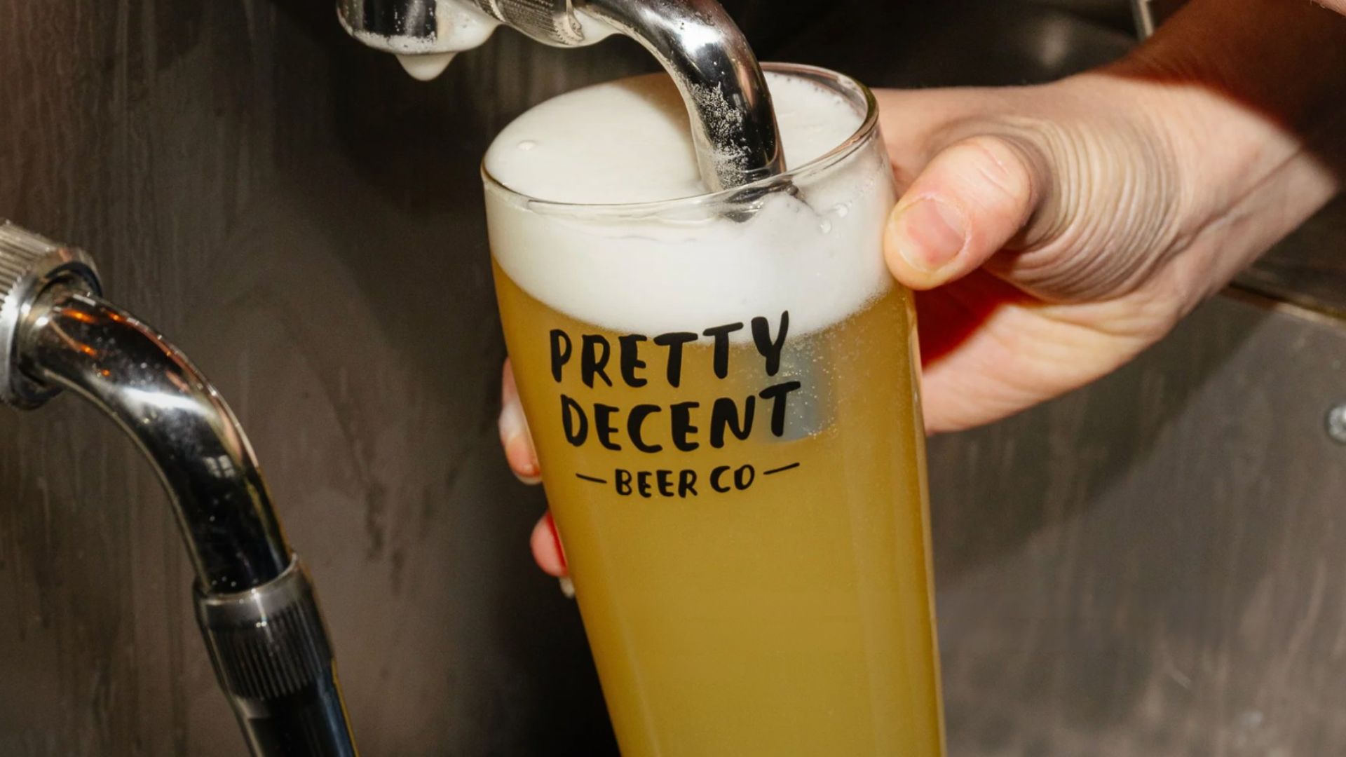 an image of a pint of pretty decent beer co being poured from one of their taproom taps