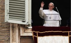 Pope Francis gives his first Angelus Blessing to the faithful from the window of his private residence on March 17 in Vatican City