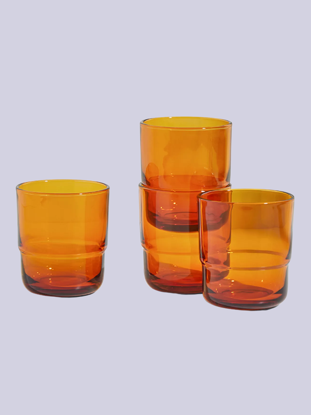 A set of four orange glasses