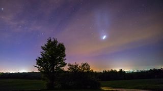 A distant shot of the SpaceX spiral in the night sky