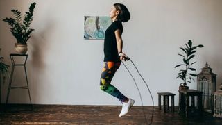 Women using skipping rope at home