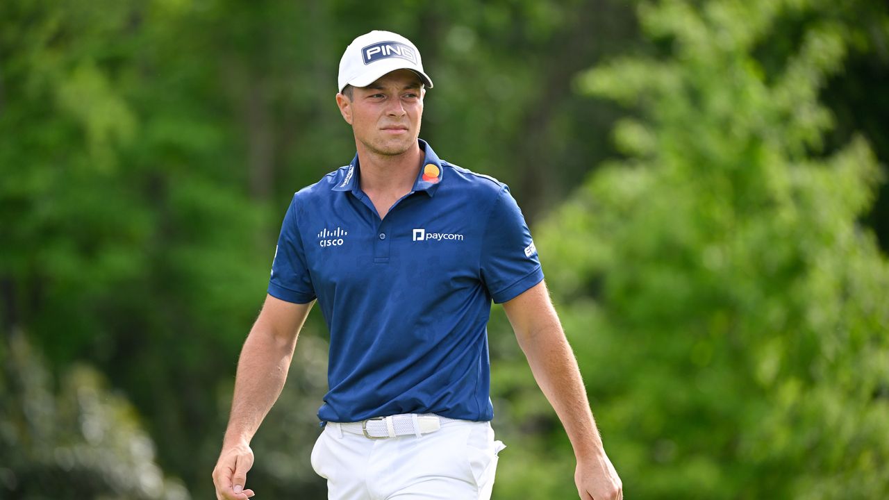 Viktor Hovland of Norway walks onto the 12th green during the first round of Wells Fargo Championship at Quail Hollow Club on May 9, 2024 in Charlotte, North Carolina.