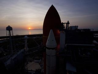 Sun rises on space shuttle Atlantis