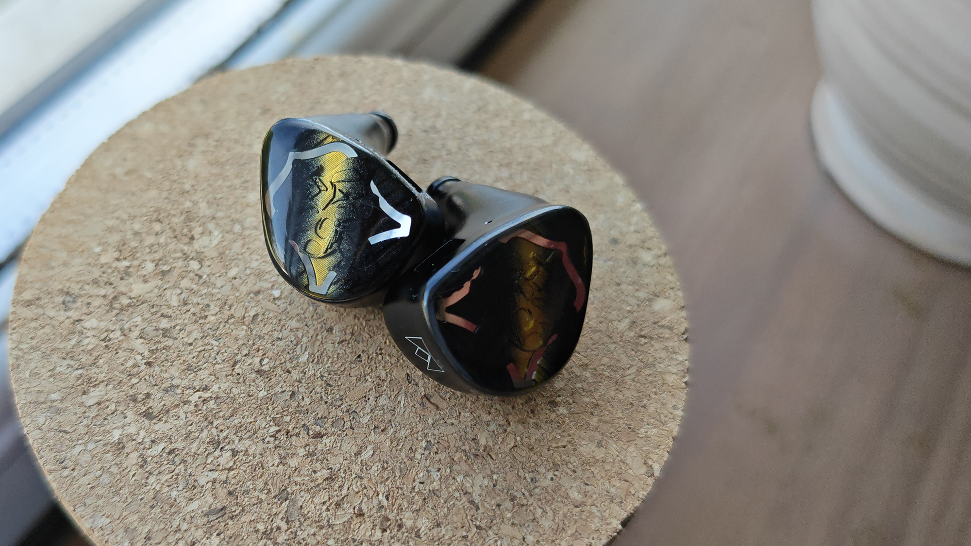 The Noble Vanguard IEMs in various positions in my home office.