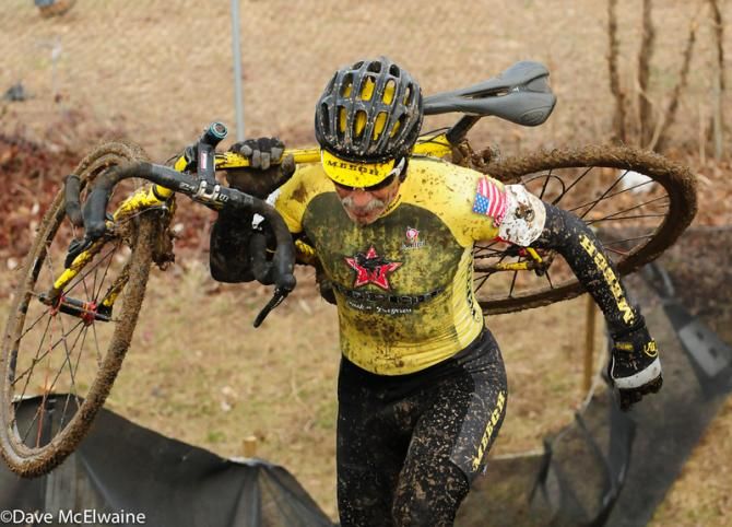 A racer running steps at the end of lap one