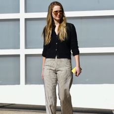 Jennifer Lawrence, celebrity style, celebrity fashion, The Row, flats, flat shoes, women's flats, sheer flats, mesh flats, nylon flats, sock flats, nude shoes, business casual, business casual outfits