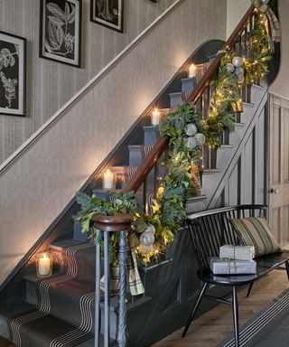 Staircase with candles and festive flowers