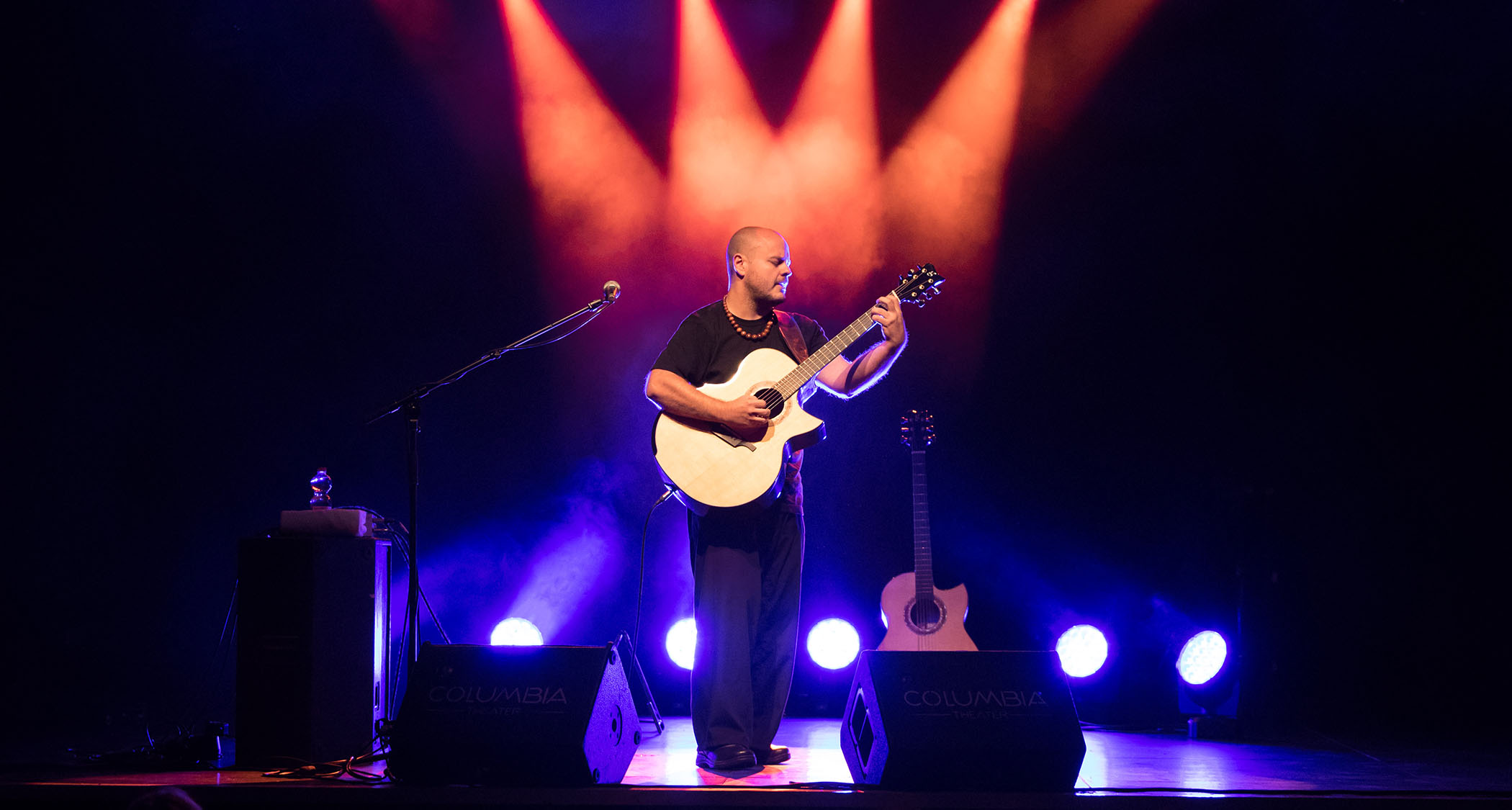 Fingerstylist Andy McKee uses a K+K Pure pickup system in his custom Greenfield acoustic as he performs here in 2018