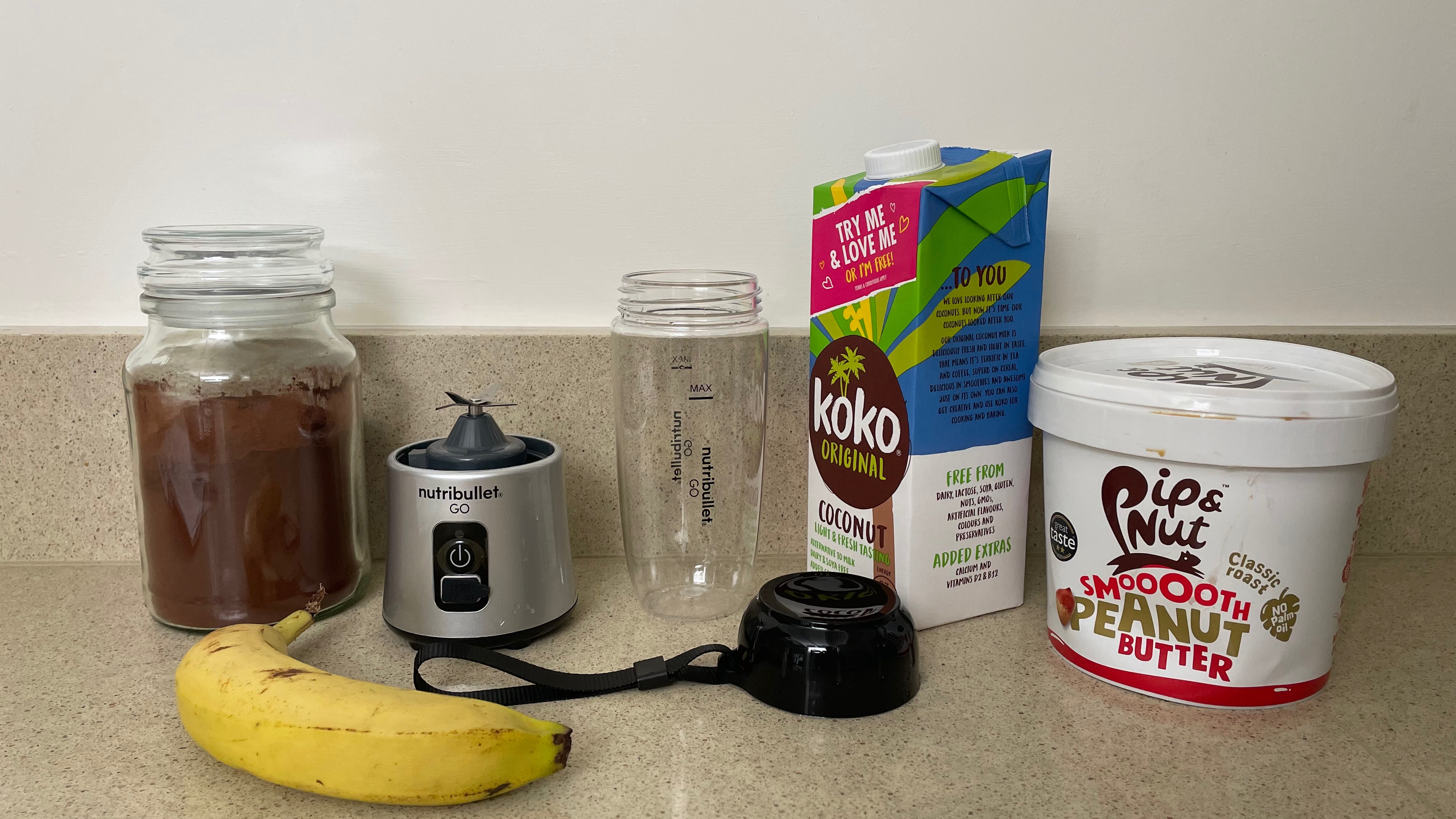 Nutribullet Go on counter with ingredients