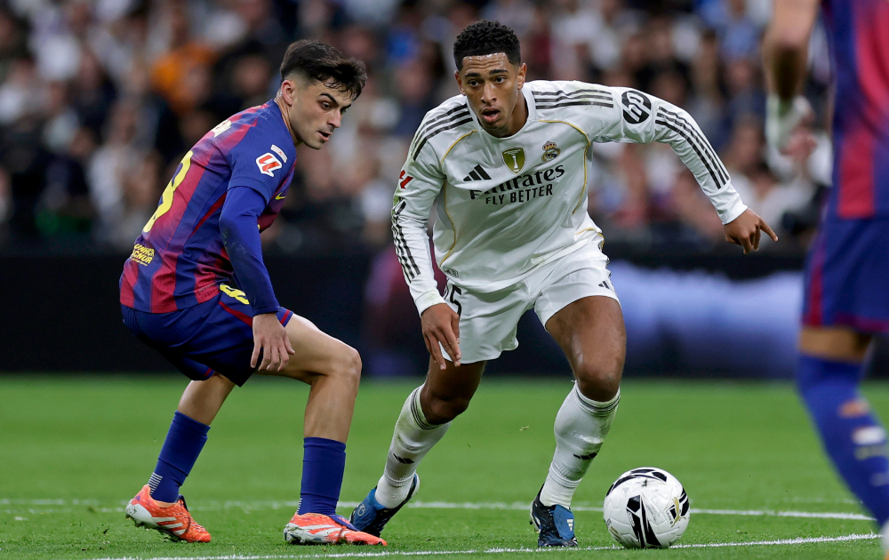 Pedri of FC Barcelona, Jude Bellingham of Real Madrid during the LaLiga EA Sports match between Real Madrid v FC Barcelona at the Estadio Santiago Bernabeu on October 26, 2025 in Madrid Spain 