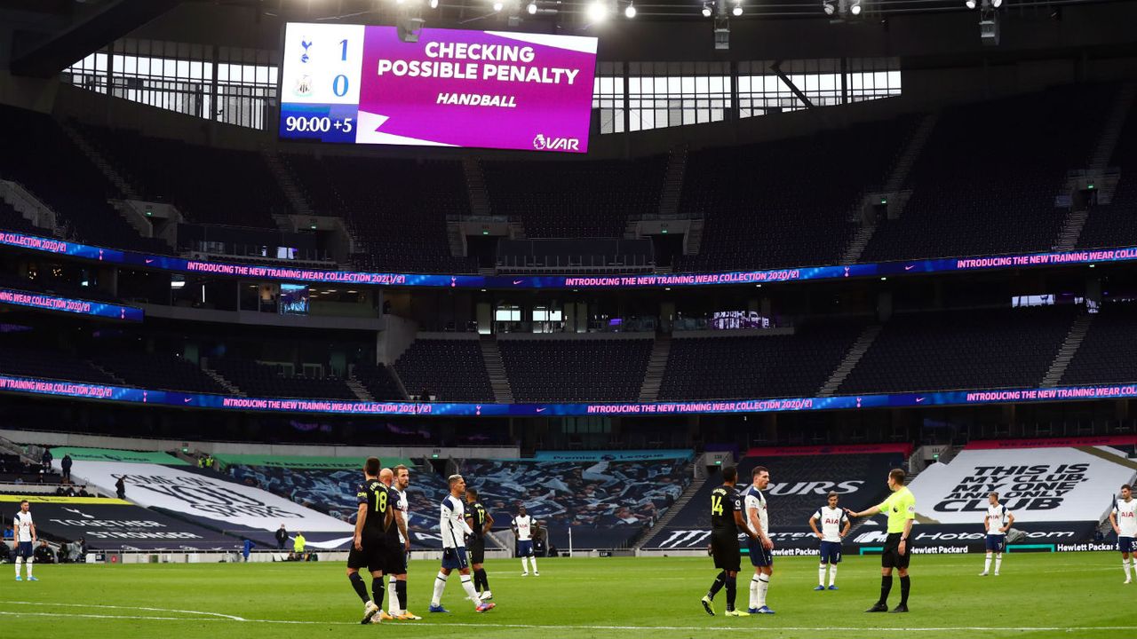 Peter Bankes awaits confirmation of a penalty from VAR during the Premier League match between Tottenham and Newcastle