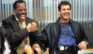 Lethal Weapon 4 Murtaugh and Riggs shake hands in the Captain's office