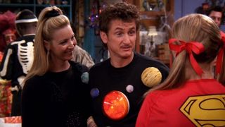 Sean Penn wears a sweater with planets on them in the Halloween episode of Friends