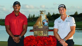 Tiger Woods and Viktor Hovland with the Hero World Challenge trophy